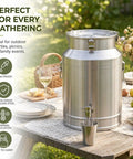 Heavy Duty 304 Stainless Steel Milk Can And Water Jug With Secure Airtight Lid Freestanding Drink Dispenser on a picnic table.