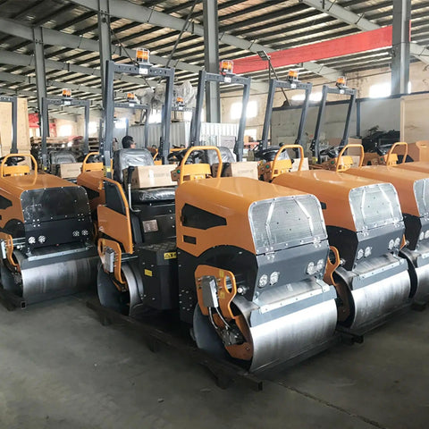 Heavy Duty 800kg Hydraulic Double Drum Vibratory Road Roller Crushes Pavement Repair Jobs With Rock Solid Asphalt Surface Leveling Gear built tough, lined up in warehouse.