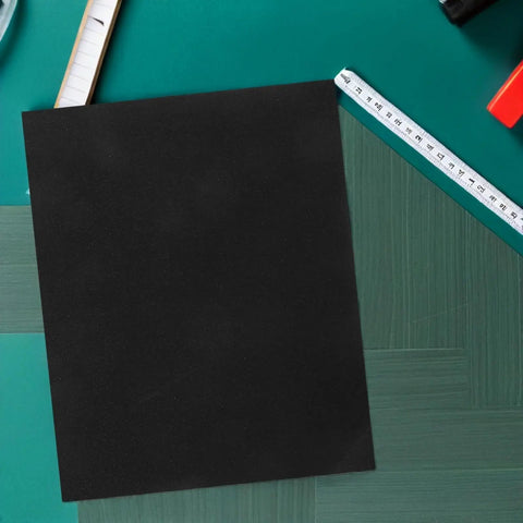 Get This Ultimate 20 Piece Wet Sanding Paper Assortment With Super Fine Grit Sheets on a table with a ruler and tools.