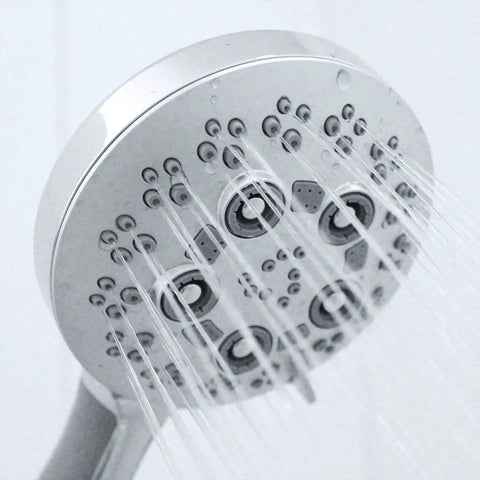 Close-up of Rio Multi-Function Handheld Shower Head With Hose, Polished Chrome Finish, 5 Spray Settings in action.