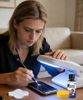 Person using scratch removal kit for screens and glasses, 100ml repair cream system, on phone under UV light, clear restoration compound