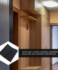 Black Peel And Stick Cabinet Wallpaper showcased in a modern kitchen with wooden cabinets and smooth surfaces.