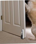 Easy Setup Rides Slick Heavy Duty Galvanized Gate Caster Wheels For Wooden Doors and Sliding Barn supports shown with door and pet.