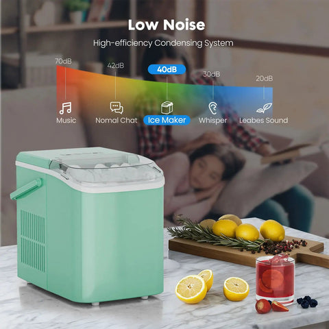 Hella Fast Portable Ice Maker With Built In Handle Makes Twenty Six Pounds Fresh Ice Daily on countertop with lemons and cocktails.