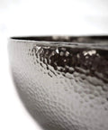 Close-up of Knockout Round Vessel Bathroom Sink 15 Gauge Hand Hammered Copper Polished Nickel Finish texture and details.