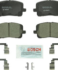 QuietCast Premium Ceramic Disc Brake Pad Set Front For Pontiac Vibe, Toyota Corolla And Matrix with hardware components