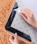 Non Slip Rug Tape Gripper Set 8 Pieces Reusable Double Sided Carpet Tape For Area Rugs On Hardwood Floors Strong Hold Adhesive Strips Perfect For Keeping Rugs In Place being applied to rug corner