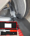 Digital Disc Brake Rotor Caliper with Large LCD Screen in use measuring brake rotor size, with red storage box visible.