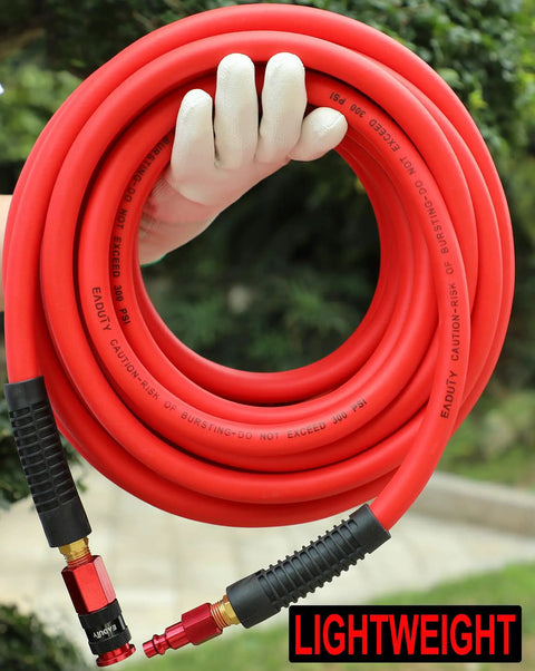 Slick Hybrid Air Compressor Hose 1/4 Inch By 25 Ft Hella Durable Lightweight held in hand with aluminum couplers visible.