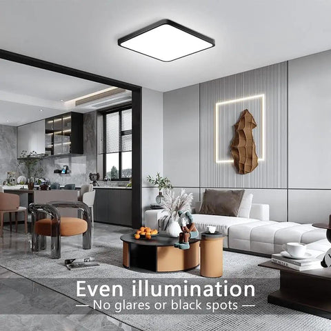 Ultra Thin 12 Inch 24W LED Flush Mount Ceiling Light 5000K Daylight White Square Surface Mount Panel Sleek Black Modern Ceiling Fixture for Bedroom Kitchen Bathroom Lit 3200 Lm Energy Saving Up To 85 Percent in a modern living room