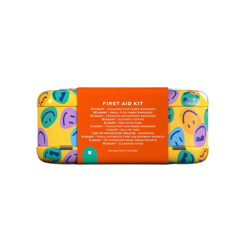 Welly First Aid Kit tin with orange label listing contents on bright yellow patterned case (front view).