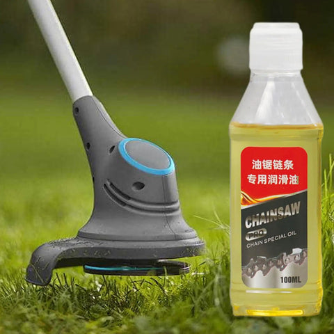 All Purpose Chainsaw Oil 100ml bottle next to a grass trimmer, showcasing synthetic lubricant for outdoor power equipment maintenance.