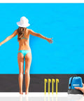 Woman holding Sandproof Waterproof Beach Blanket, Extra Large 79x55 Inch Outdoor Mat For 1-4 Adults, shown with stakes and carry bag.
