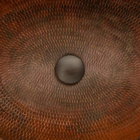 Close-up of Oil Rubbed Bronze 1.5 Inch Non Overflow Pop Up Bathroom Sink Drain With Push Pop Top Design