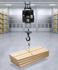 Heavy Duty Electric Hoist With 1102 Lb Capacity And Wired Remote Control Lift For Garage Shop Or Factory Jobs Featuring Fast 1800W Copper Motor lifting lumber in warehouse.