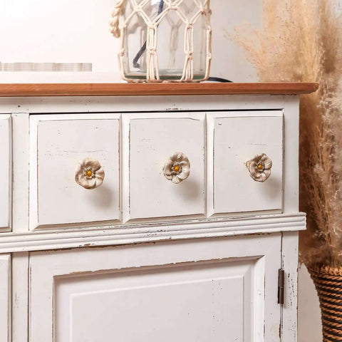 Premium Zinc Alloy Cabinet Knobs 4 Pack Featuring Floral Rhinestone Inlays on white dresser with rustic finish.