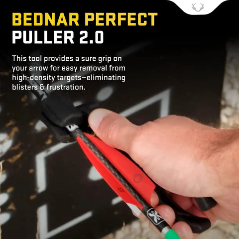 Close-up of a hand using Bednar Perfect Puller 2.0 Arrow Remover for high density targets showing no fuss blister free pullout