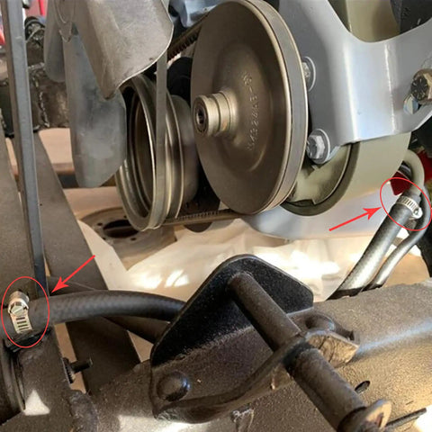 Close-up of stainless steel hose clamps set on automotive radiator hoses, part of beefy heavy duty adjustable worm gear clamp kit