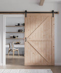 48 Inch By 84 Inch Wood Barn Door With 8 Foot Hardware Kit Included K Shape Solid Spruce Panel in installed position.