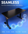 One-Piece Electric Standing Desk With Four Memory Presets, 176 Lb Capacity, Ultra Quiet Lift, Seamless 48 By 24 Inch Desktop, Perfect For Home Office And Dual Monitor Setups, Stable, Sturdy, Black Finish shown from above