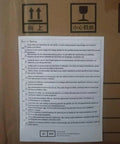 Box with both 'This Side Up' and 'Fragile' symbols, showing multilingual instructions and warnings about electrical safety.