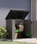 34 Cu Ft Horizontal Resin Storage Shed With Floor Included For Outdoor Use Weatherproof And Lockable, open with garden tools inside.