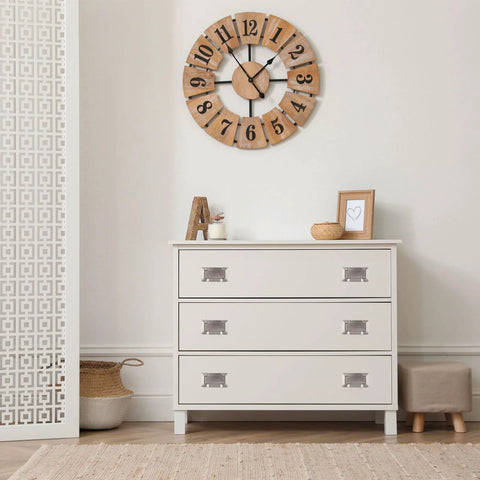 White dresser with 4 Pack Nickel Pocket Door Handles Flush Ring Pulls in a modern room with a decorative wall clock.