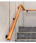 Adjustable Stainless Steel Railing Posts And Black Powder Coated Deck Railing Kit For Indoor Stairs Outdoor Porch Steps Floor Mount Baluster System mounted on stylish wood and black support.