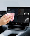 Front view: pink microfiber cleaning cloth wiping car touchscreen display; 6 x 7 inch.