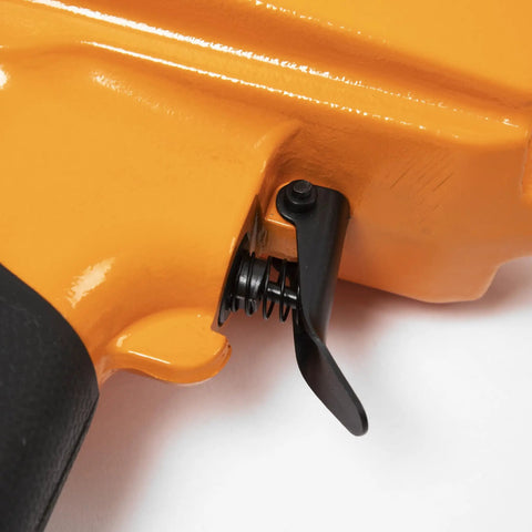 Close-up of Pro Grade Air Punch Nailer Nail Remover Pneumatic Puller trigger mechanism for Denailing and Wood Recycling, Heavy Duty Fastener.