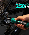 Heavy Duty Cordless Electric Screwdriver Kit With 51 Magnetic Bits And Integrated Led Light, Rechargeable Power Tool Built Tough For Plug And Play Furniture Assembly And No Sweat Home Projects in use on a bicycle.