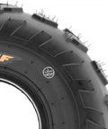 Close-up of an All Terrain ATV Tire 18x7-7 tubeless 4 ply with directional V knobby tread A007, side view.