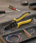 This awesome Self-Adjusting Wire Stripper And Cutter Is A Total Game Changer For Any Electrician Or Diy Pro on a work surface with wires and tools.
