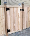 Wooden fence gate with Heavy Duty 3-1/2 Inch T Hinge Gate Hinges Steel With Black Finish Includes Screws 6 Pack installed.