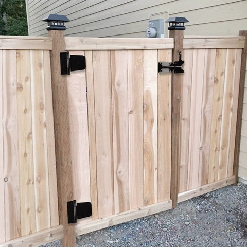 Wooden fence gate with Heavy Duty 3-1/2 Inch T Hinge Gate Hinges Steel With Black Finish Includes Screws 6 Pack installed.