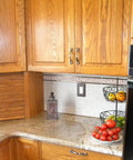 Kitchen counter with wood cabinets and countertop sealed using Exact Color Caulk Sealant In 9.5 Ounce Cartridges Six Pack Contractor Case Pro Grade