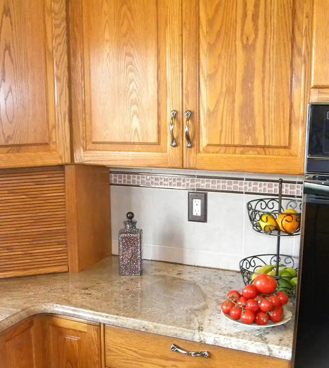 Kitchen counter with wood cabinets and countertop sealed using Exact Color Caulk Sealant In 9.5 Ounce Cartridges Six Pack Contractor Case Pro Grade