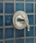 Simplice Rite-Temp Shower Trim Kit With One-Handle Temp Control on blue tiled wall, polished chrome finish