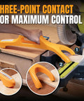 Hand using Dual Notch Safety Push Stick with Loop Handle Grip on miter saw, showing front and rear notches for enhanced control.