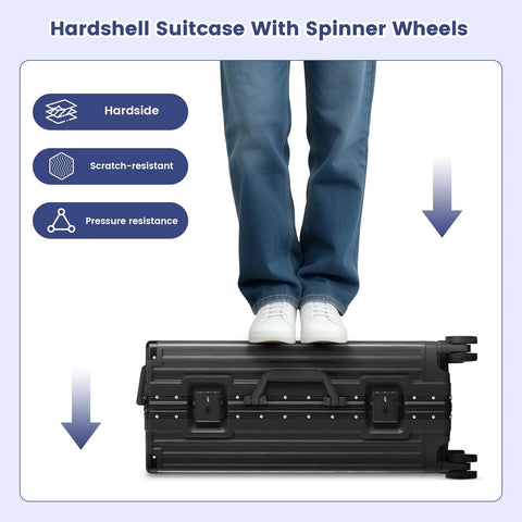 Front view of a black 20-inch hard-shell carry-on suitcase with spinner wheels; person standing on top