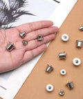 Rock Solid Stainless Steel Dowel Pins Center Point Set With 40 Pieces, showcasing various sizes in hand on paper background.