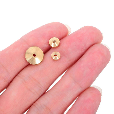 Sturdy 36 Pieces Of Brass Golden Clock Hands And Nuts For Quartz Movement Repair, High Quality Wall Clock Hardware Replacement Parts To Fix Your Timepiece Like A Pro, showing three brass nuts in a hand.