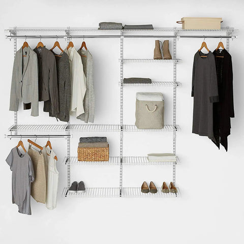 Expandable 26 Inch Shelf Kit Two Shelves White With Durable Epoxy Finish installed in a closet with clothes and storage items