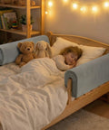 Heavy Duty Toddler Bed Rail Bumper Guards Thick Foam Crash Cushions For Bunk Bedroom Lofts Kidproof Edge Padding with a sleeping child.