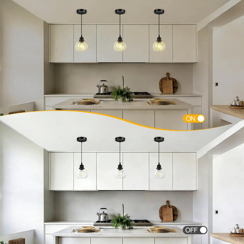 Dope Matte Black Pendant Light For Kitchen Island With Clear Glass Globe Shade, lit and unlit in modern kitchen setting, E26 base
