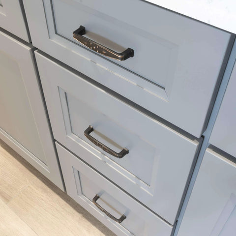 Solid Zinc Alloy Cabinet Pull Handle With Traditional Classic Design In Oil Rubbed Bronze, 4.25 Inch Overall Length, installed on cabinets