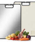 Double Sided Cutting Board With Stainless Steel Edge And Wheat Straw Side Non Toxic Chopping Board With Juice Groove Garlic Grinder And Non Slip Base For Mess Free Kitchen Prep Fourteen By Ten Inches with vegetables and meat