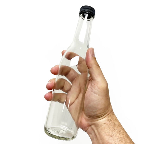 Set Of Twelve Clear Glass Woozy Bottles Packed In A Sturdy Box With Fifteen Black Screw Caps Featuring Food Grade Liners Super Handy For Storing Your Homemade Hot Sauces Oils Dressings Vinegars And Limoncello Each Holds Twelve Point Seven Ounces