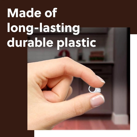 Hand holding Cabinet Restrictor Clips For Grass TEC 864 Hinges Snap In Hinge Stops made of durable plastic for cabinets.