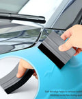 Gomake vehicle vinyl wrap tool kit: close-up of gray 4-inch felt squeegee with black edge applying car wrap on window